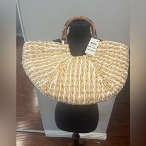 NWT Large sized straw tote with bamboo handle .